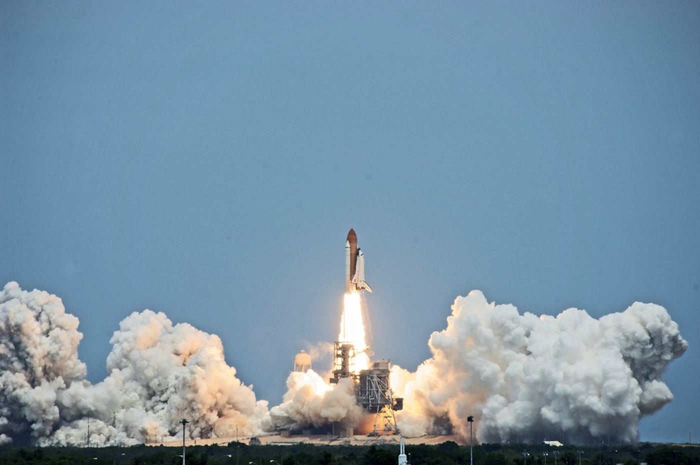 Space Shuttle Atlantis lifting off from Kennedy Space Center for the STS-125 Hubble servicing mission